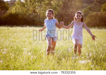 Group Of Happy Children Playing