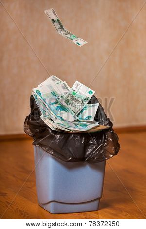 Rubles Are Thrown In The Trash Bin