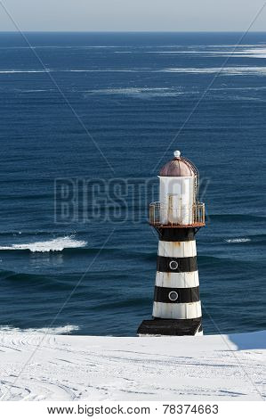 Lighthouse On Coast Of Pacific Ocean