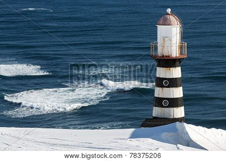 Lighthouse On Coast Of Pacific Ocean. Petropavlovsk-kamchatsky