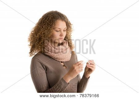 Girl Looks At Thermometer