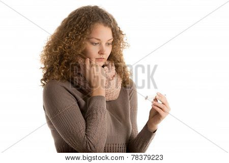 Girl Wraps Herself Up In Scarf Checking Temperature