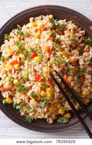 Fried Rice With Eggs, Corn And Parsley Closeup Vertical Top View