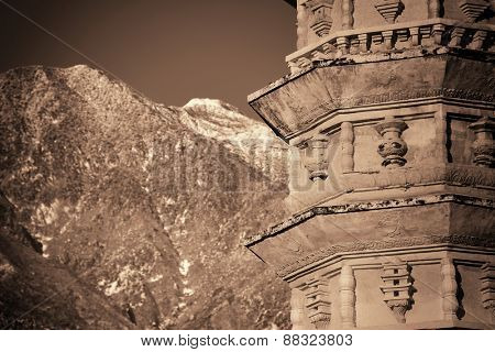 Dali Old Town with pagoda and snow capped Cangshan in Yunnan, China.