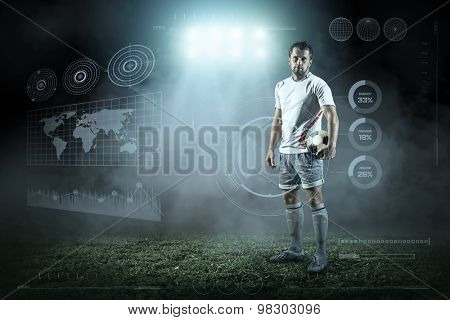 Soccer player with ball in action outdoors