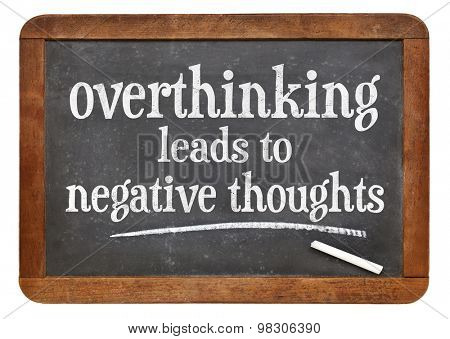 Overthinking leads to negative thoughts - warning on a vintage slate blackboard