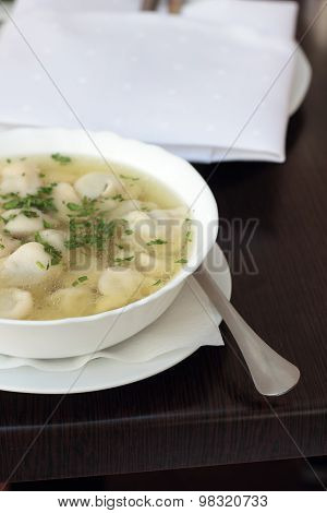 Broth with dumplings.