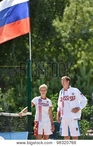 MOSCOW, RUSSIA - JULY 16, 2015: Daria Churakova (left) and Nikolay Guryev of Russia during the ITF Beach Tennis World Team Championship. 28 nations compete in the event this year