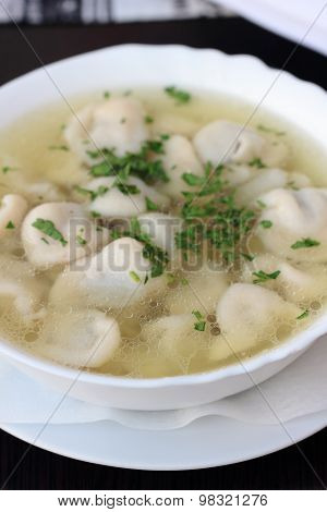 Broth with dumplings.