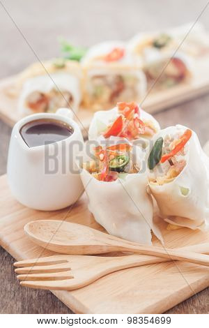 Fresh Spring Rolls On Wooden Table