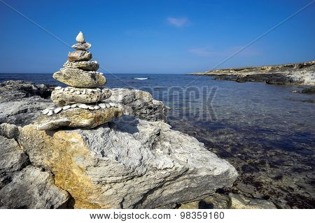 Stone pyramid on the beach.