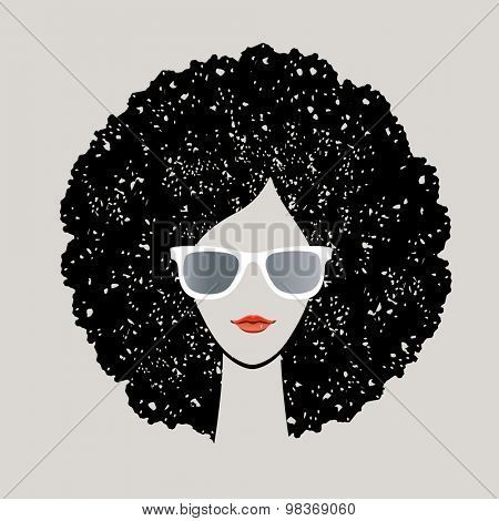 Girl with black afro and sunglasses
