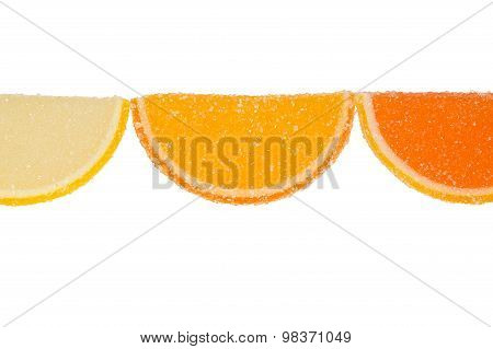 Three Slices Of  Marmalade On A White Background.