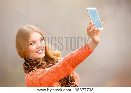 Girl Taking Self Picture With Phone Outdoors