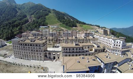 SOCHI, RUSSIA - AUG 2, 2014: Top view of the ski resort town Gorki Gorod at an altitude plus 960 meters above sea level, aerial view