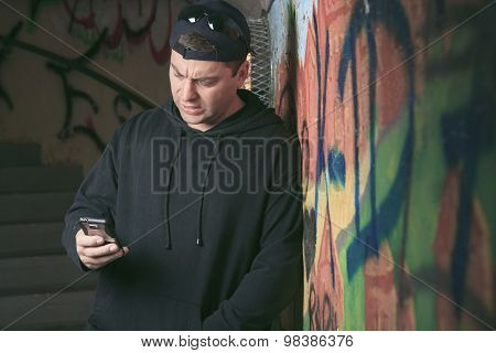 Drug dealer in a tunnel. A dark place to deal person.