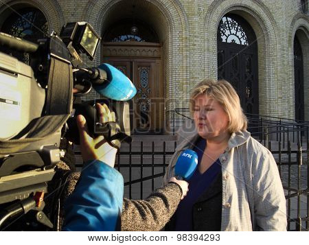 Erna Solberg in 2008 outside the Norwegian parliament building