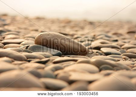 Closeup of stone with sunrise natural background