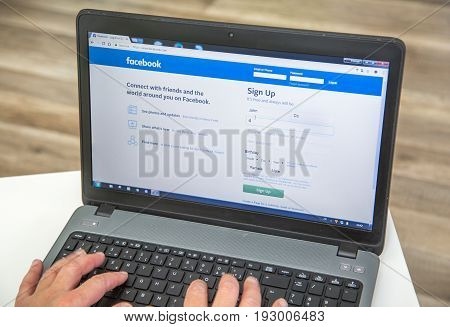 Paris, France - January 27, 2017 : Man Using A Laptop To Create A User Account On The Social Network