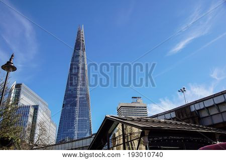 LONDON - APR 20 : The Shard building and riverside pictured on April 20th, 2013, in London. The Shard opened to the public on February 2013. Standing 309m, the Shard is the tallest building in Europe.