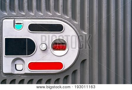 Coin acceptor for payments reception free space. Coin acceptor in vending machine copy space. Grey metal background