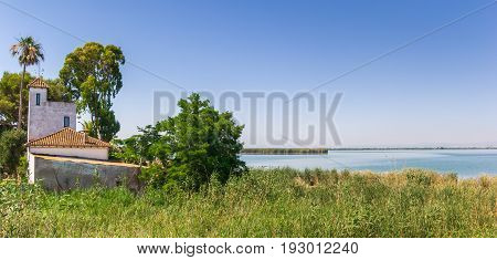White house at the lake in La Albufera National Park near Valencia Spain
