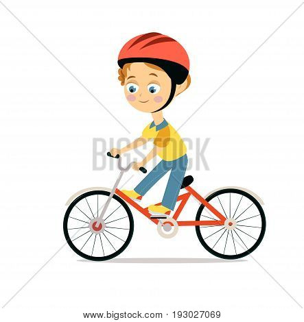 Happy little boy in helmet riding bicycle