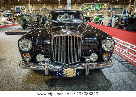 MAASTRICHT NETHERLANDS - JANUARY 14 2016: High-performance luxury car Bentley Continental S2 Drophead Coupe by Park Ward 1963. International Exhibition InterClassics & Topmobiel 2016