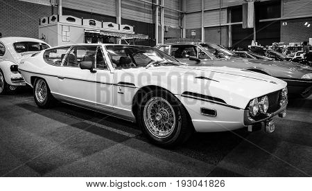 MAASTRICHT NETHERLANDS - JANUARY 15 2016: Grand tourer coupe Lamborghini Espada Series II 1972. Black and white. International Exhibition InterClassics & Topmobiel 2016