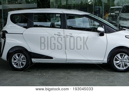 BANGKOK - JUNE 11: TOYOTA SIENTA white color on display at Toyota Buzz Ratchapruck branch Showroom car in Bangkok Thailand.