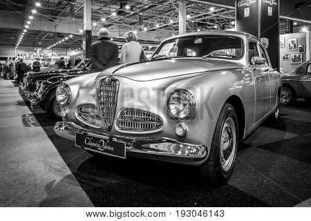 MAASTRICHT NETHERLANDS - JANUARY 15 2016: Executive car Alfa Romeo 1900 Berlina 1954. Black and white. International Exhibition InterClassics & Topmobiel 2016