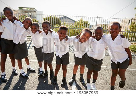Elementary school kids in Africa posing in school playground