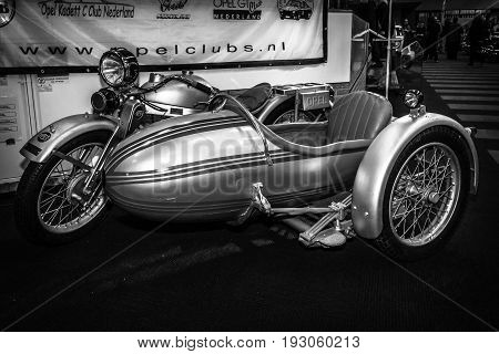 MAASTRICHT NETHERLANDS - JANUARY 15 2016: Motorcycle with sidecar Opel Elite 500 1928. Black and white. International Exhibition InterClassics & Topmobiel 2016