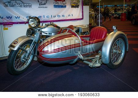 MAASTRICHT NETHERLANDS - JANUARY 15 2016: Motorcycle with sidecar Opel Elite 500 1928. International Exhibition InterClassics & Topmobiel 2016