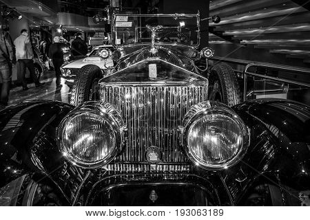 MAASTRICHT NETHERLANDS - JANUARY 15 2016: Vintage car Rolls-Royce Phantom I Pall Mall Tourer 1927. Black and white. International Exhibition InterClassics & Topmobiel 2016