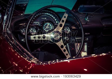 MAASTRICHT NETHERLANDS - JANUARY 15 2016: Cabin of a sports car Chevrolet Corvette (C1) 1960. Styling. Toning. International Exhibition InterClassics & Topmobiel 2016