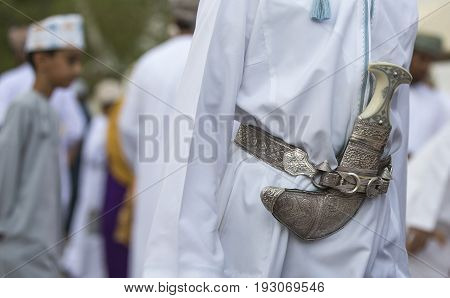traditional khanjar dagger is part of man's traditional outfit in Oman during selebrations