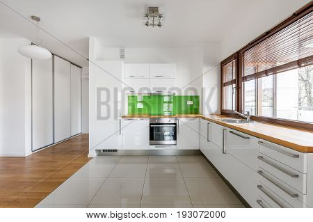 White, Open Kitchen With Window