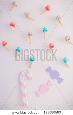 Children's zone with sweets: lollipops, ice cream and candy.
