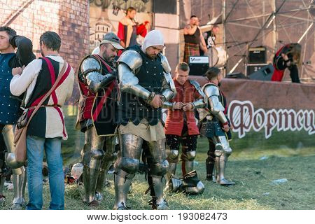 TROSTYANETS, UKRAINE - JUNE 25, 2017: Old Castle fest in action. Knights fight just beginning. This is 8 time traditional fest with historical costumes, foods and fights.