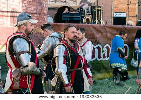 TROSTYANETS, UKRAINE - JUNE 25, 2017: Old Castle fest in action. Knights fight just beginning. This is 8 time traditional fest with historical costumes, foods and fights.