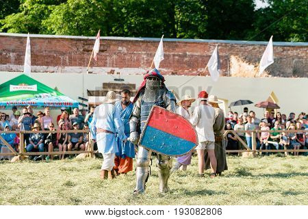 TROSTYANETS, UKRAINE - JUNE 25, 2017: Old Castle fest in action. Knights fight just beginning. This is 8 time traditional fest with historical costumes, foods and fights.