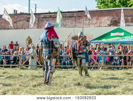 TROSTYANETS, UKRAINE - JUNE 25, 2017: Old Castle fest in action. Knights fight just beginning. This is 8 time traditional fest with historical costumes, foods and fights.