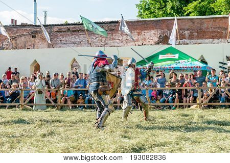 TROSTYANETS, UKRAINE - JUNE 25, 2017: Old Castle fest in action. Knights fight just beginning. This is 8 time traditional fest with historical costumes, foods and fights.