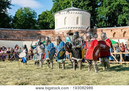 TROSTYANETS, UKRAINE - JUNE 25, 2017: Old Castle fest in action. Knights fight just beginning. This is 8 time traditional fest with historical costumes, foods and fights.