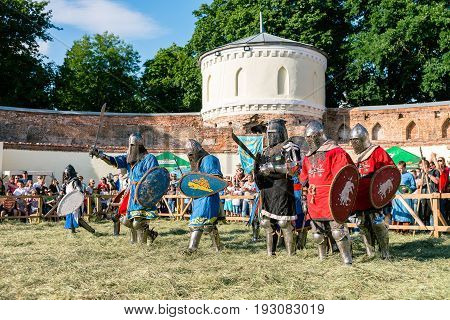 TROSTYANETS, UKRAINE - JUNE 25, 2017: Old Castle fest in action. Knights fight just beginning. This is 8 time traditional fest with historical costumes, foods and fights.