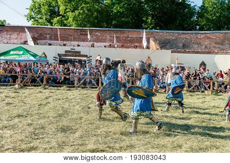 TROSTYANETS, UKRAINE - JUNE 25, 2017: Old Castle fest in action. Knights fight just beginning. This is 8 time traditional fest with historical costumes, foods and fights.