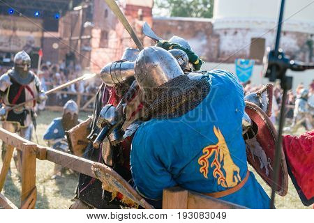 TROSTYANETS, UKRAINE - JUNE 25, 2017: Old Castle fest in action. Knights fight just beginning. This is 8 time traditional fest with historical costumes, foods and fights.