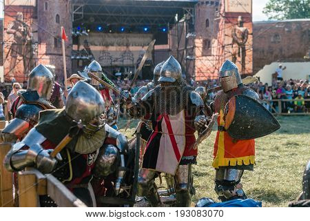 TROSTYANETS, UKRAINE - JUNE 25, 2017: Old Castle fest in action. Knights fight just beginning. This is 8 time traditional fest with historical costumes, foods and fights.