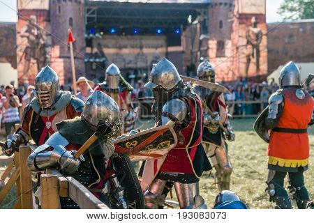 TROSTYANETS, UKRAINE - JUNE 25, 2017: Old Castle fest in action. Knights fight just beginning. This is 8 time traditional fest with historical costumes, foods and fights.